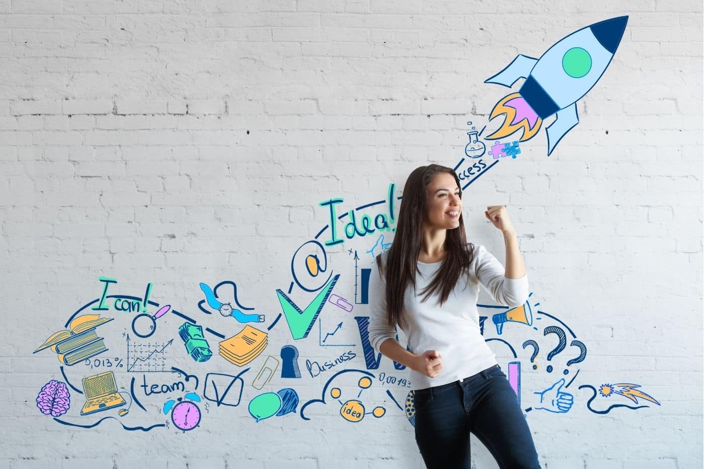 Motivated woman standing in front of graffiti rocket depicting the stages of business growth.