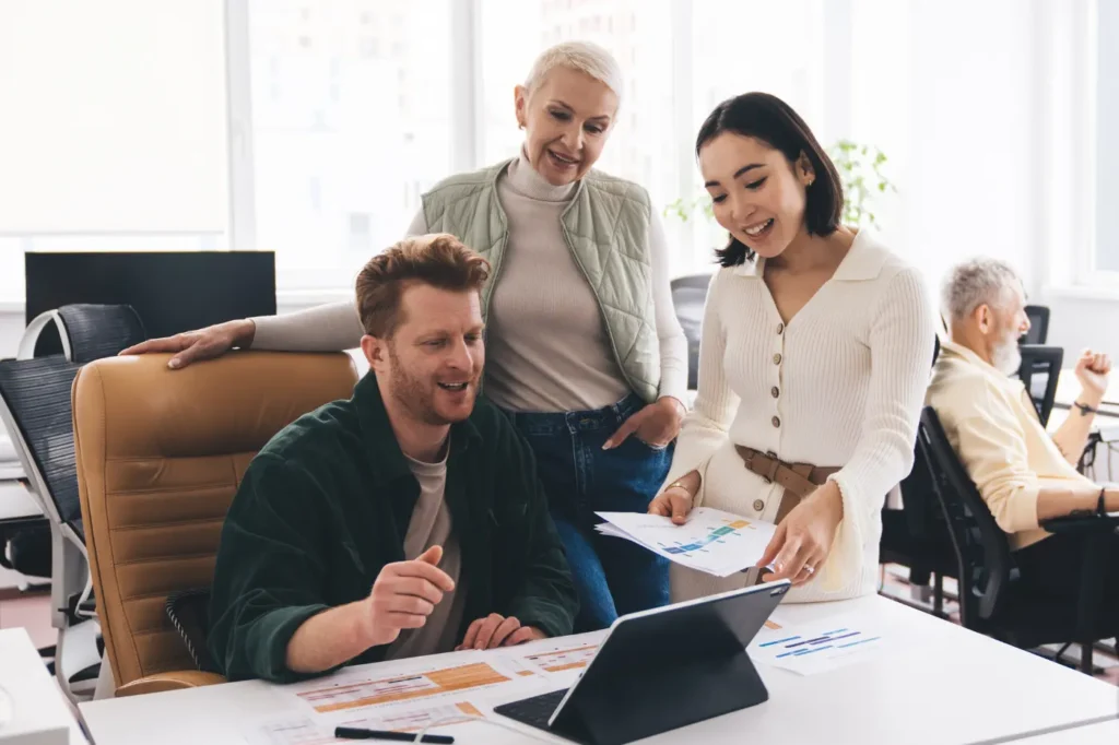 A team of employees discussing their marketing campaign